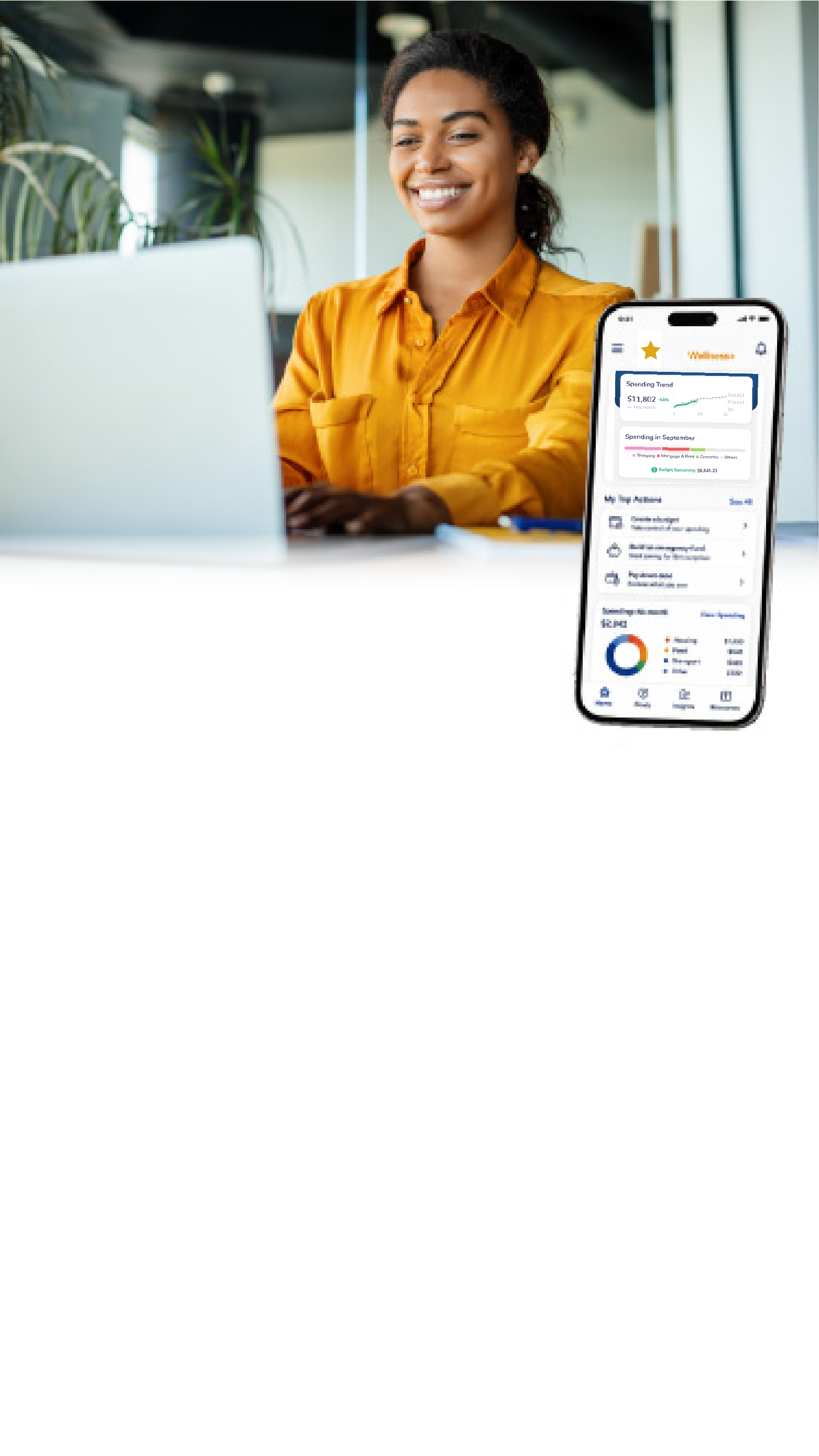 Women by computer with Wellness+ mobile image.